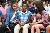 A photo of student laughing in a crowd. Links to Donor-Advised Funds